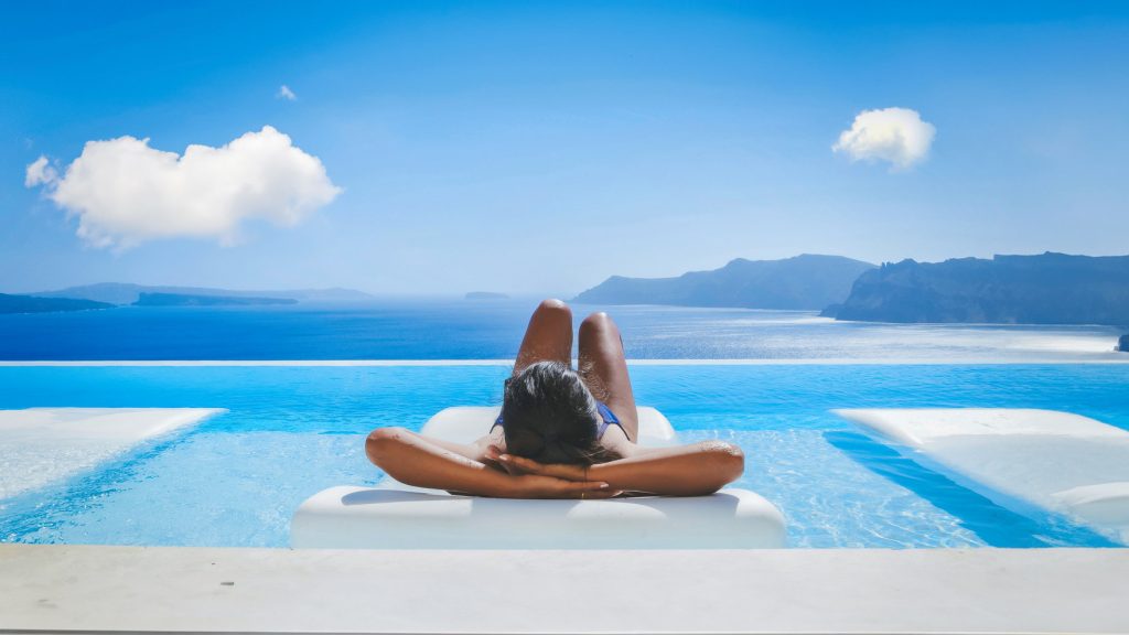Young,Asian,Women,On,Vacation,At,Santorini,Relaxing,In,A