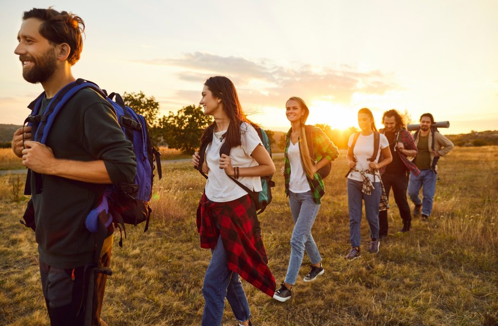 Joyful,Team,Of,Hikers,On,A,Nature,Trip,,Exploring,The